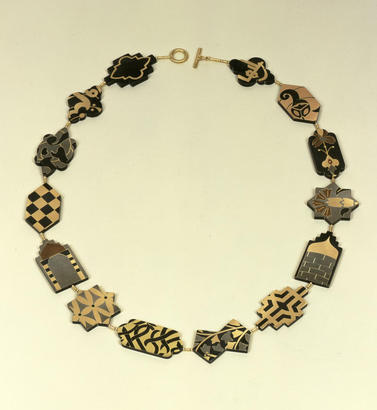 Suzan Rezac. Jewelry. "Memento". Shakudo, 18K yellow gold, red gold, green gold, shibuichi, copper. Constructed. Inlay. 